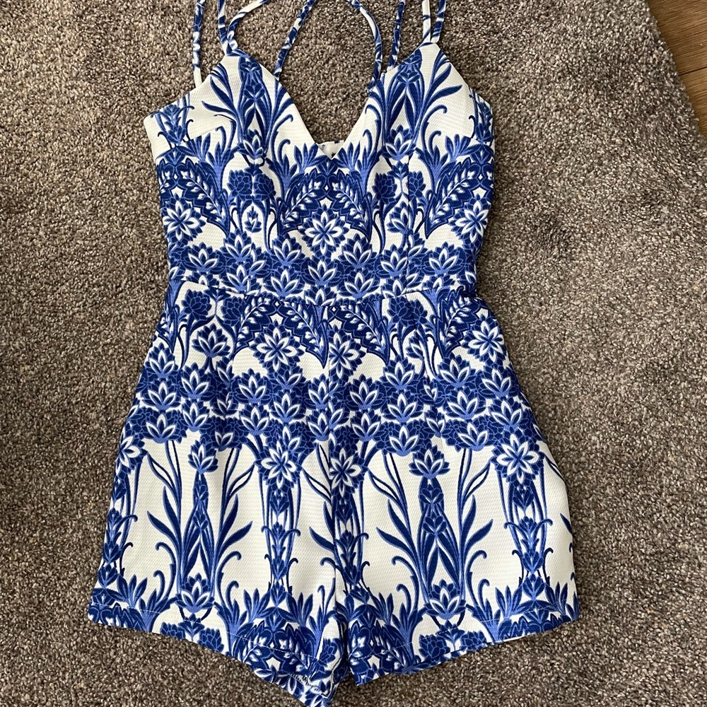 Blue & white Missguided romper. Never worn.